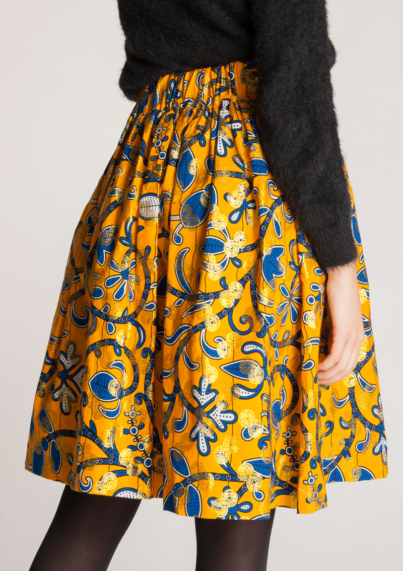 Cora & Lea-woman-Bowie évasé skirt and long midi. African Wax-Print, yellow, blue and gold stamping. 