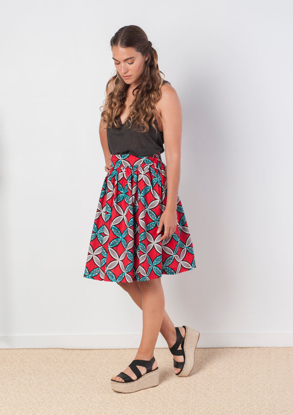 Cora & Lea-woman-Bowie évasé skirt and long midi. African Wax-Print, red, blue and white geometric prints.